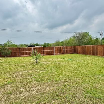 Full-perimeter fence on an open lot